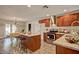 Well-appointed kitchen with granite countertops, stainless steel appliances, and wood cabinetry at 1045 S Solomon St, Mesa, AZ 85204