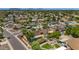 Scenic aerial view of neighborhood showcasing manicured lawns and mature landscaping at 10590 E Mercer Ln, Scottsdale, AZ 85259