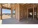 Spacious garage with wood framework ready for customization providing ample parking and storage space at 11338 E Utah Ave, Mesa, AZ 85212