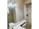 Well-lit bathroom with prominent vanity mirror and walk-in shower stall at 1304 E Hackamore St, Mesa, AZ 85203