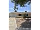 Single-story home with desert landscaping, a driveway, attached garage, and a welcoming front entrance at 1304 E Hackamore St, Mesa, AZ 85203