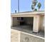 Large garage with ample shelving and storage space, complemented by neutral walls and a concrete floor at 1304 E Hackamore St, Mesa, AZ 85203