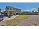 View of backyard with lawn, patio, and privacy fence at 15040 W Windrose Dr, Surprise, AZ 85379