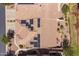 Aerial view showcases a roof with solar panels and a well-maintained backyard at 1552 E Manor Dr, Casa Grande, AZ 85122