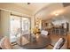 Open dining area connects to the living room and kitchen, perfect for entertaining at 1552 E Manor Dr, Casa Grande, AZ 85122