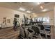 Bright gym featuring multiple treadmills and elliptical machines for residents at 1552 E Manor Dr, Casa Grande, AZ 85122