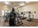 Well-equipped gym with elliptical machines and treadmills for a complete workout at 1552 E Manor Dr, Casa Grande, AZ 85122