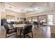 Meeting room featuring tables, chairs, hardwood floors, and bright lighting at 1552 E Manor Dr, Casa Grande, AZ 85122