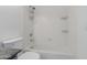 Bright bathroom featuring a shower and tub with white tile surround at 1600 N Saba St # 151, Chandler, AZ 85225