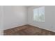 Empty bedroom with neutral carpet and a window letting in natural light at 1600 N Saba St # 151, Chandler, AZ 85225
