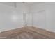 Cozy bedroom with neutral carpet, white walls, and a closet with sliding doors at 1600 N Saba St # 151, Chandler, AZ 85225