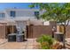 Charming townhome featuring a private front patio with mature landscaping and individual AC units at 1600 N Saba St # 151, Chandler, AZ 85225