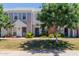 Charming townhome with well-maintained lawn and landscaping, providing inviting curb appeal at 1600 N Saba St # 151, Chandler, AZ 85225