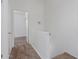 Upstairs hallway featuring neutral carpet and white walls at 1600 N Saba St # 151, Chandler, AZ 85225