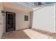 Small back patio with door to the home at 1600 N Saba St # 151, Chandler, AZ 85225