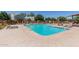 Community pool area with lounge seating and easy access to neighborhood amenities at 1600 N Saba St # 151, Chandler, AZ 85225