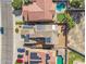 Bird's eye view of home with solar panels, patio, lush landscaping, and neighborhood at 16118 W Port Au Prince Ln, Surprise, AZ 85379