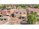 View of the backyard featuring a covered patio and block wall fence, creating a serene retreat at 16118 W Port Au Prince Ln, Surprise, AZ 85379