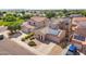 Well-maintained home featuring a tile roof, solar panels and a driveway with parking at 16118 W Port Au Prince Ln, Surprise, AZ 85379