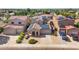 Charming single-Gathering home featuring a tile roof and solar panels for energy efficiency at 16118 W Port Au Prince Ln, Surprise, AZ 85379