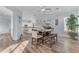 Bright dining area featuring stylish table set with room for everyone at 18199 W Buckhorn Dr, Goodyear, AZ 85338