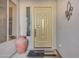 Inviting front door with decorative accents and a unique door design at 18199 W Buckhorn Dr, Goodyear, AZ 85338