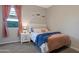 Charming bedroom featuring a cozy bed, soft color palette, and a peaceful ambiance at 18837 W San Juan Ave, Litchfield Park, AZ 85340