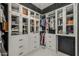 Organized closet featuring custom shelving and storage space, providing lots of room and dark accents at 199 E Tangerine Path, Queen Creek, AZ 85140
