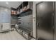 Organized mud room with ample storage, shelving, and a convenient bench for everyday use at 199 E Tangerine Path, Queen Creek, AZ 85140