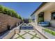 The backyard features a pool, patio, and lounge area for relaxing and enjoying the outdoors at 199 E Tangerine Path, Queen Creek, AZ 85140