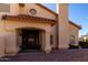Home's front entrance has desert landscaping, providing low-maintenance curb appeal to the property at 2004 N 125Th Ave, Avondale, AZ 85392