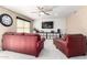 Cozy living room with neutral carpet and two inviting sofas, perfect for relaxation at 2004 N 125Th Ave, Avondale, AZ 85392