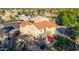 Expansive backyard view of a two-story home with a covered patio, hot tub, and landscaping offering a private outdoor retreat at 2004 N 125Th Ave, Avondale, AZ 85392