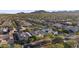 Aerial neighborhood view highlighting community landscaping, streets, and surrounding scenery at 20595 W Pasadena Ave, Buckeye, AZ 85396