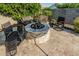 Inviting backyard fire pit area with comfortable seating, ideal for outdoor gatherings at 20595 W Pasadena Ave, Buckeye, AZ 85396