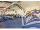 Spacious fitness center with state-of-the-art equipment, treadmills, and elliptical machines at 20595 W Pasadena Ave, Buckeye, AZ 85396