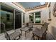 Relaxing covered patio space with comfortable seating, perfect for entertaining at 20595 W Pasadena Ave, Buckeye, AZ 85396