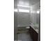 Bathroom features a tub and shower combination, along with a single sink vanity at 22632 W Solano Dr, Buckeye, AZ 85326