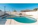 Backyard pool with refreshing blue water and a view of the exterior fence at 2342 N 40Th Ave, Phoenix, AZ 85009