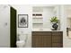 A clean bathroom with neutral tones, a white vanity, and a walk-in shower at 25052 N 174Th Ln, Surprise, AZ 85387