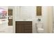 Bright bathroom features a stylish vanity, white fixtures, and decorative accents at 25052 N 174Th Ln, Surprise, AZ 85387
