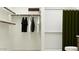 Walk-in closet featuring a shower, shelving and ample clothing storage space at 25052 N 174Th Ln, Surprise, AZ 85387