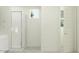 Modern bathroom with a glass-enclosed shower, neutral tones, and a clean design at 25424 N 176Th Ave, Surprise, AZ 85387