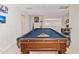 Spacious game room with a full-sized pool table, perfect for entertaining at 25546 N 164Th Dr, Surprise, AZ 85387