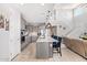 Modern kitchen with gray cabinetry, quartz counters, and stainless steel appliances at 25546 N 164Th Dr, Surprise, AZ 85387