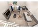 Aerial view of open-concept living area featuring high ceilings, kitchen island, and comfortable seating at 25546 N 164Th Dr, Surprise, AZ 85387