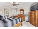 Comfortable main bedroom with neutral carpet, and ceiling fan at 25546 N 164Th Dr, Surprise, AZ 85387
