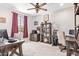 Spacious office featuring matching desks, shelving, and a large window with mountain views at 25546 N 164Th Dr, Surprise, AZ 85387