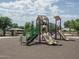 Colorful community playground featuring slides and climbing structures for fun at 25546 N 164Th Dr, Surprise, AZ 85387