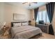 Bedroom with large window and gray scale color pallet at 26333 W Vista North Dr, Buckeye, AZ 85396